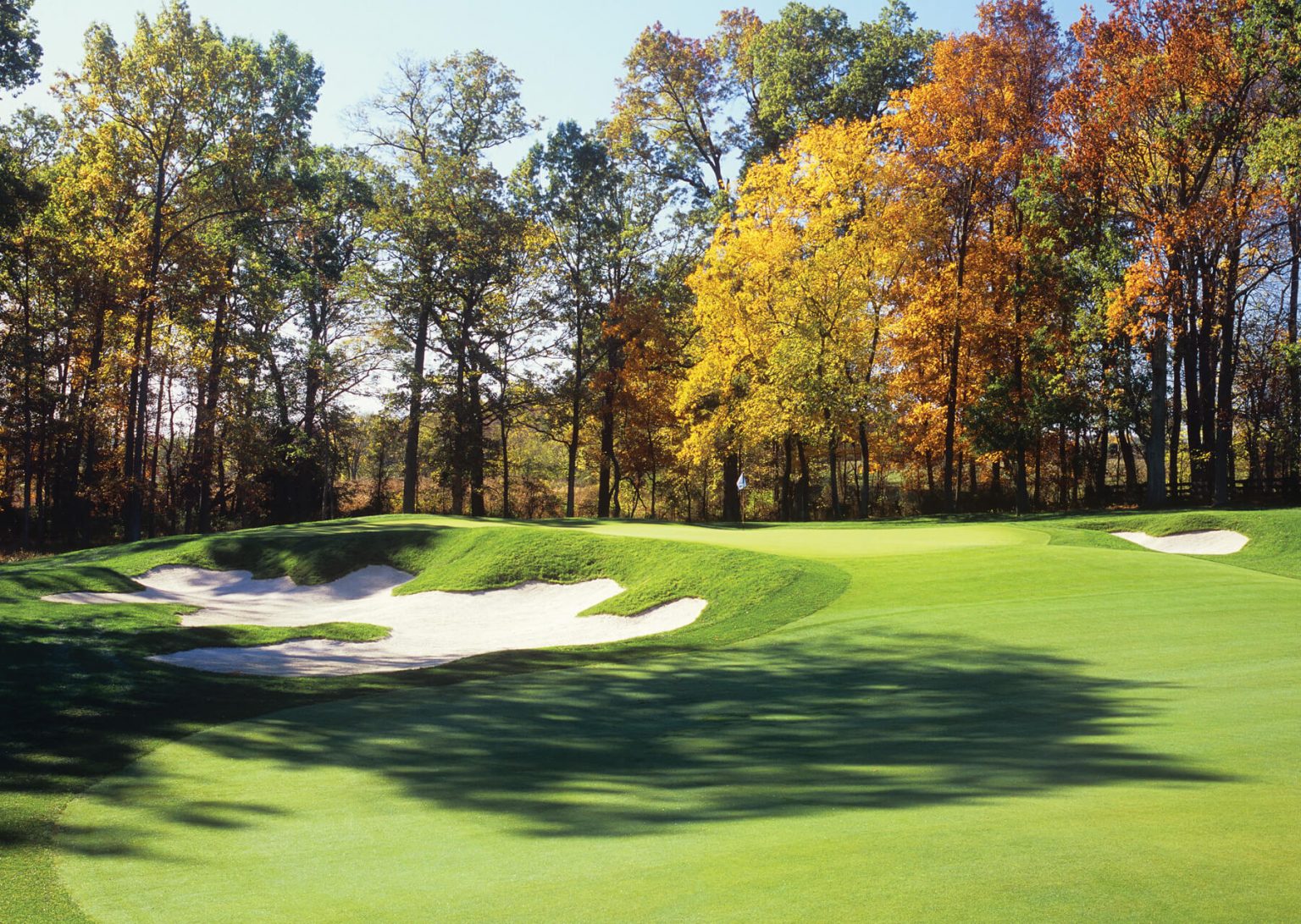 creighton farms fifth hole with bunkers and trees